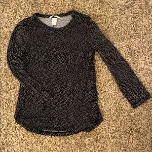 black shirt with white speckles